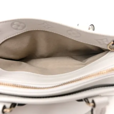 Louis Vuitton OnTheGo East West PM White Embossed Monogram Calfskin Leather Light Gold Hardware