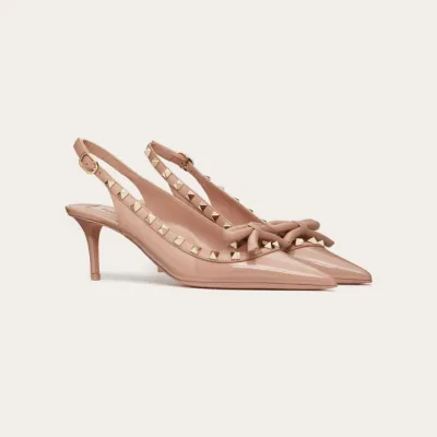 VALENTINO Lace-up heels in patent leather with rivet bow in the same color (heel height: 6cm)