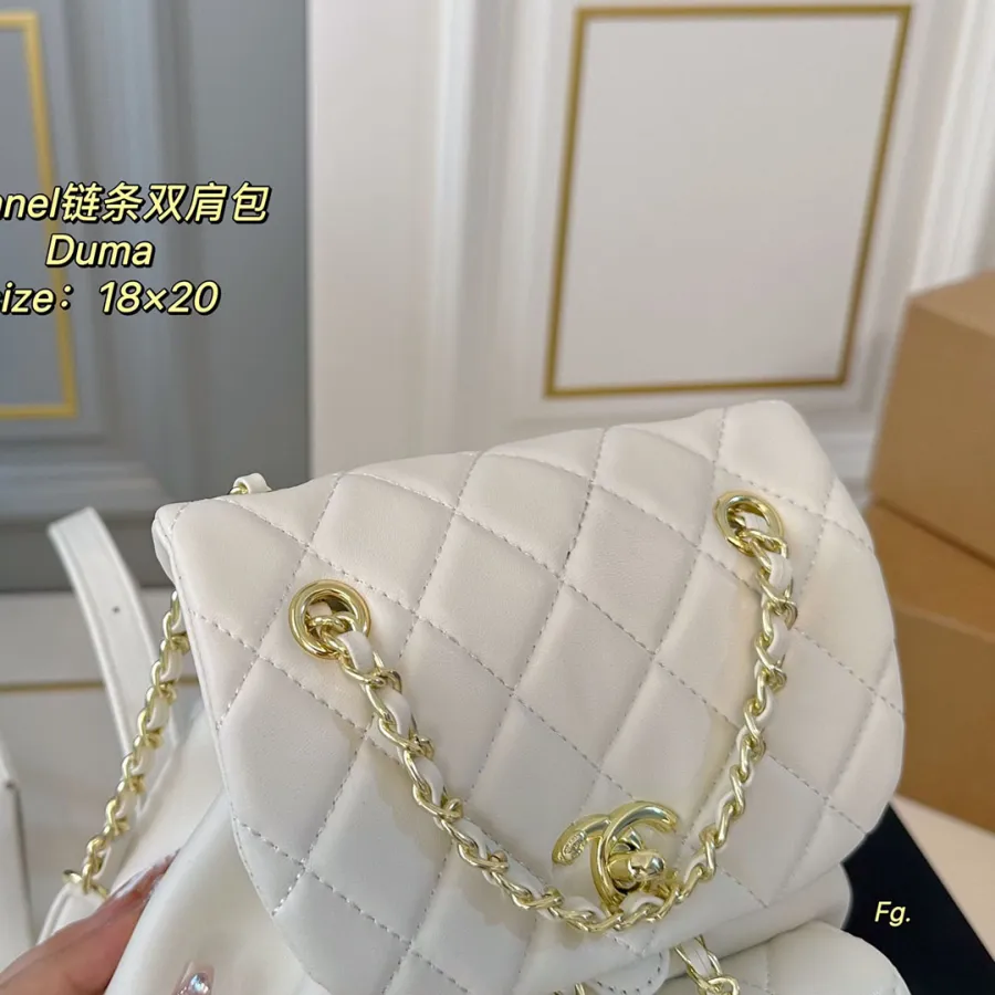 Chanel Pink / Yellow / White / Black Quilted Lambskin Leather Backpacks