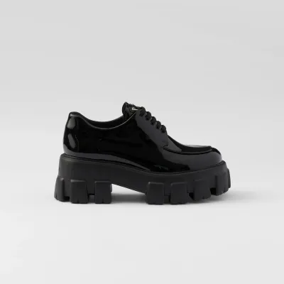 PRADA Black Monolith lacquered leather lace-up shoes