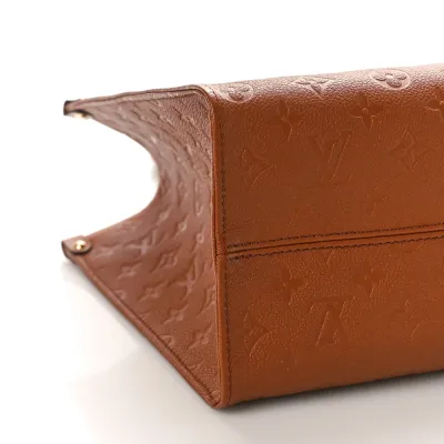 Louis Vuitton Neverfull MM Cognac Giant Monogram Empreinte Leather