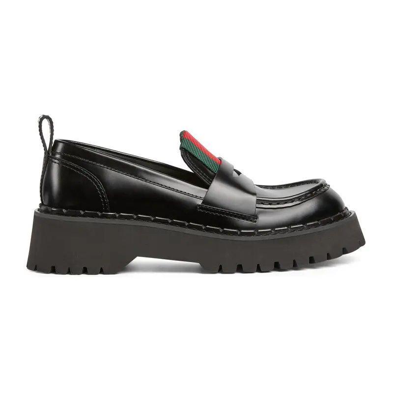 Gucci mocassins de tecido preto.