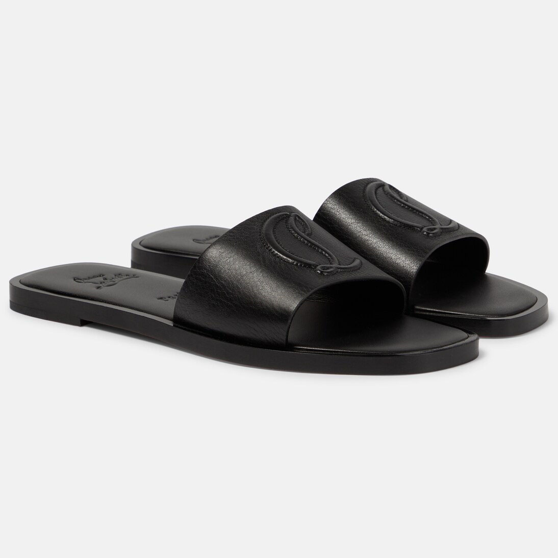 Christian Louboutin Sandálias rasteiras pretas.