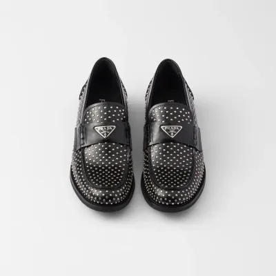 PRADA Studded shiny leather loafers