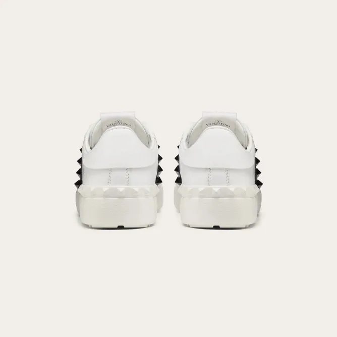 VALENTINO Women's studded calf leather sneakers in the same color