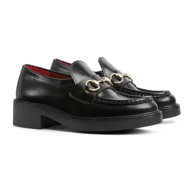 Gucci black thick soled loafers