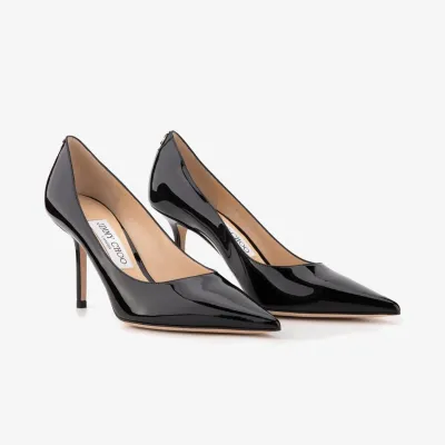 JIMMY CHOO JC badge embellishes black Patent paint leather high heels