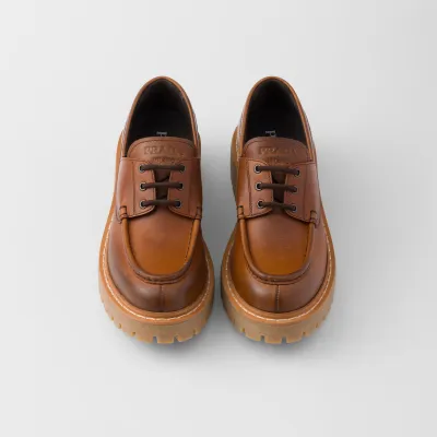 PRADA Lace-up leather loafers in cognac