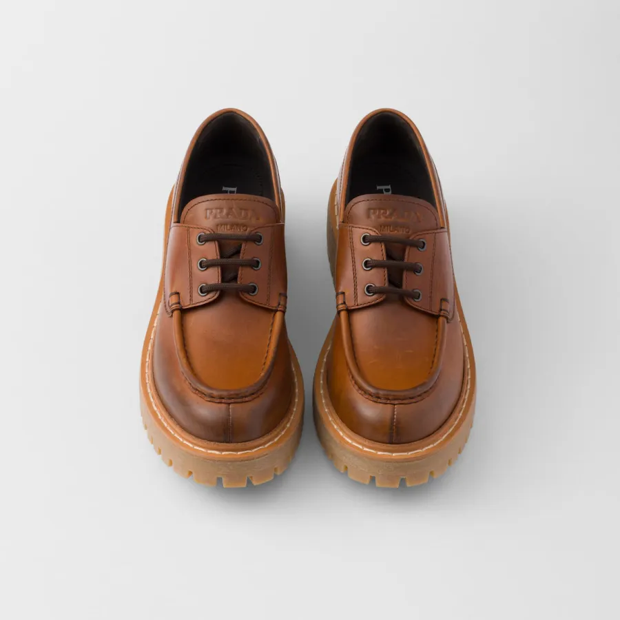 PRADA Lace-up leather loafers in cognac
