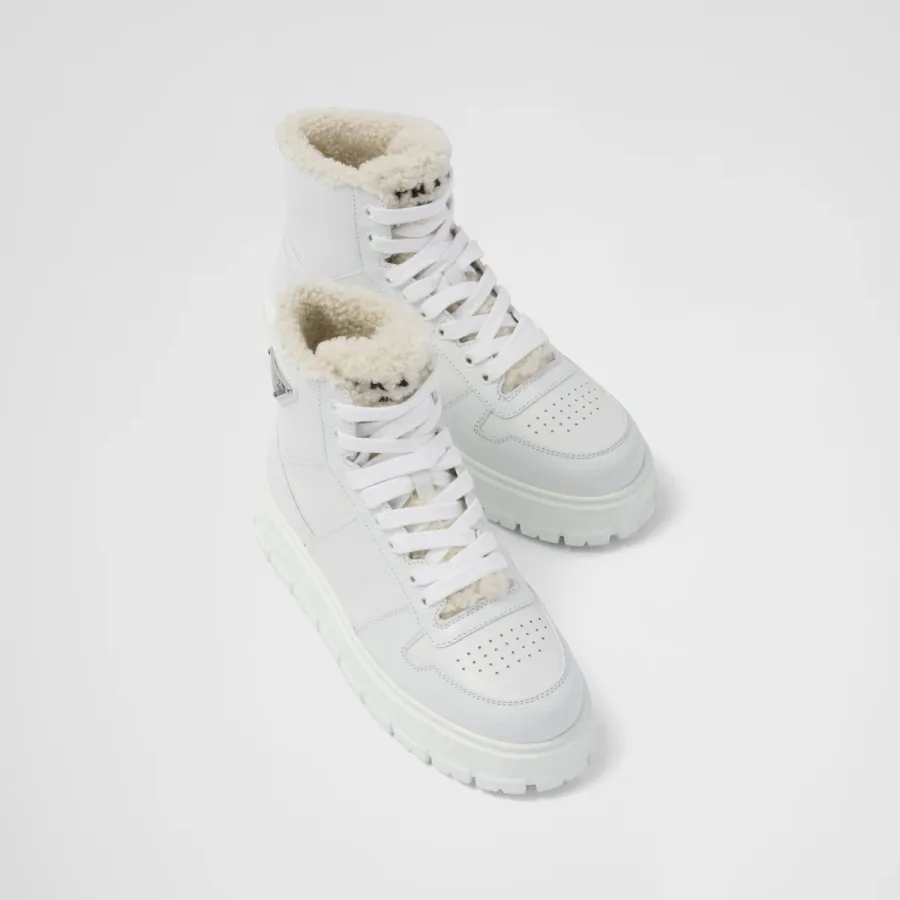 PRADA White leather and sheepskin high-top sneakers
