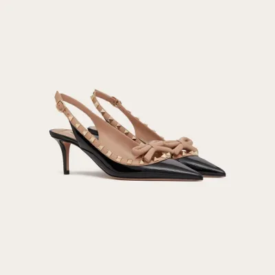VALENTINO Lace-up heels in patent leather with studded bow (heel height: 6cm)