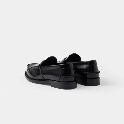 PRADA Black shiny leather loafers