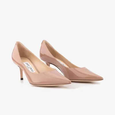 JIMMY CHOO JC badge embellishes pink high heels