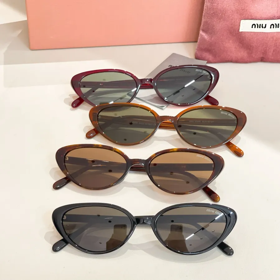 Miu Miu Cat Eye glasses red/brown/leopard/black color Size 55口18-147