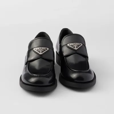 PRADA Black shiny leather loafers