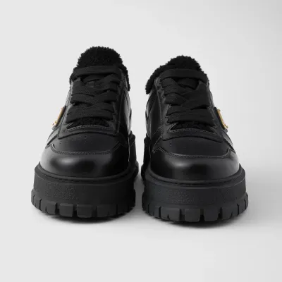 PRADA Black leather sneakers