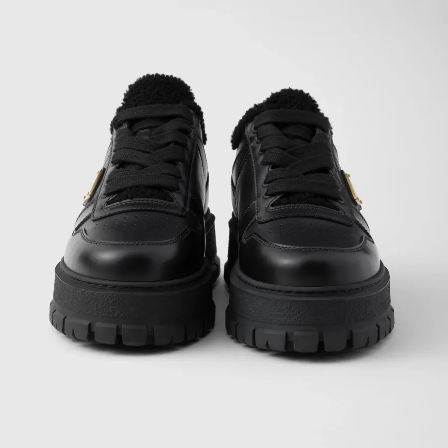 PRADA Black leather sneakers