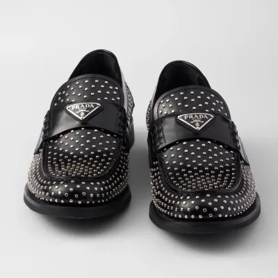 PRADA Studded shiny leather loafers
