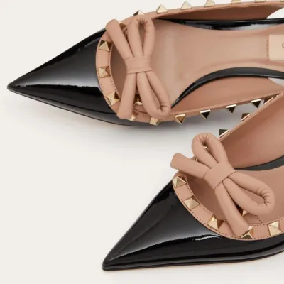 VALENTINO Lace-up heels in patent leather with studded bow (heel height: 6cm)