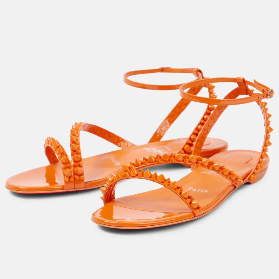 Christian Louboutin Orange flat sandals with diagonal rivets
