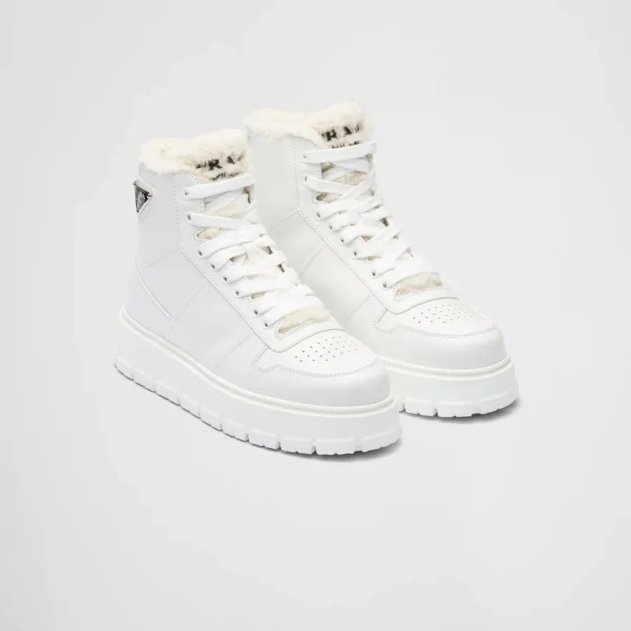 PRADA White leather and sheepskin high-top sneakers