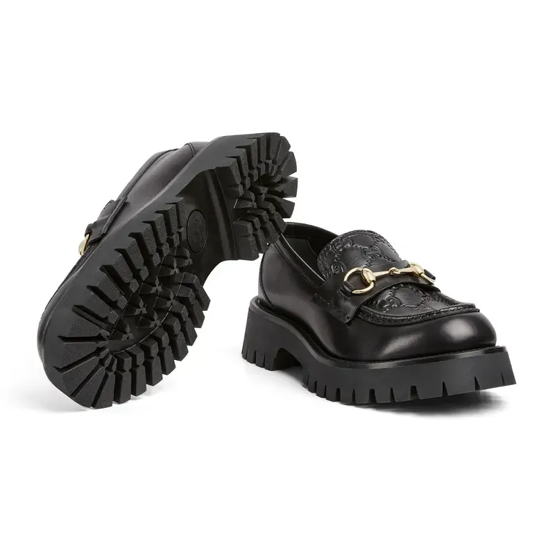 Gucci black thick bottom loafers