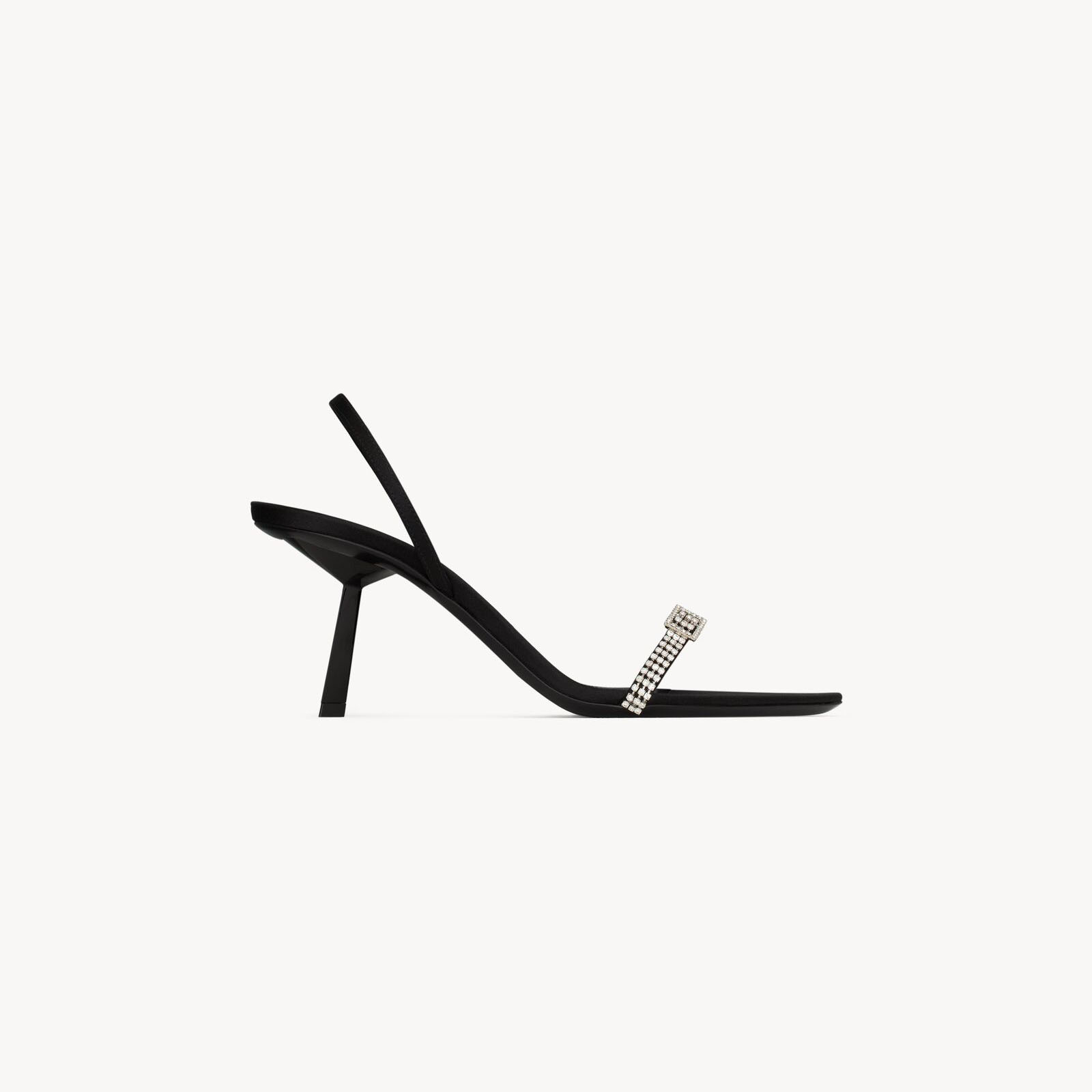 Yves Saint Laurent sandálias stiletto pretas com pontas de broca.