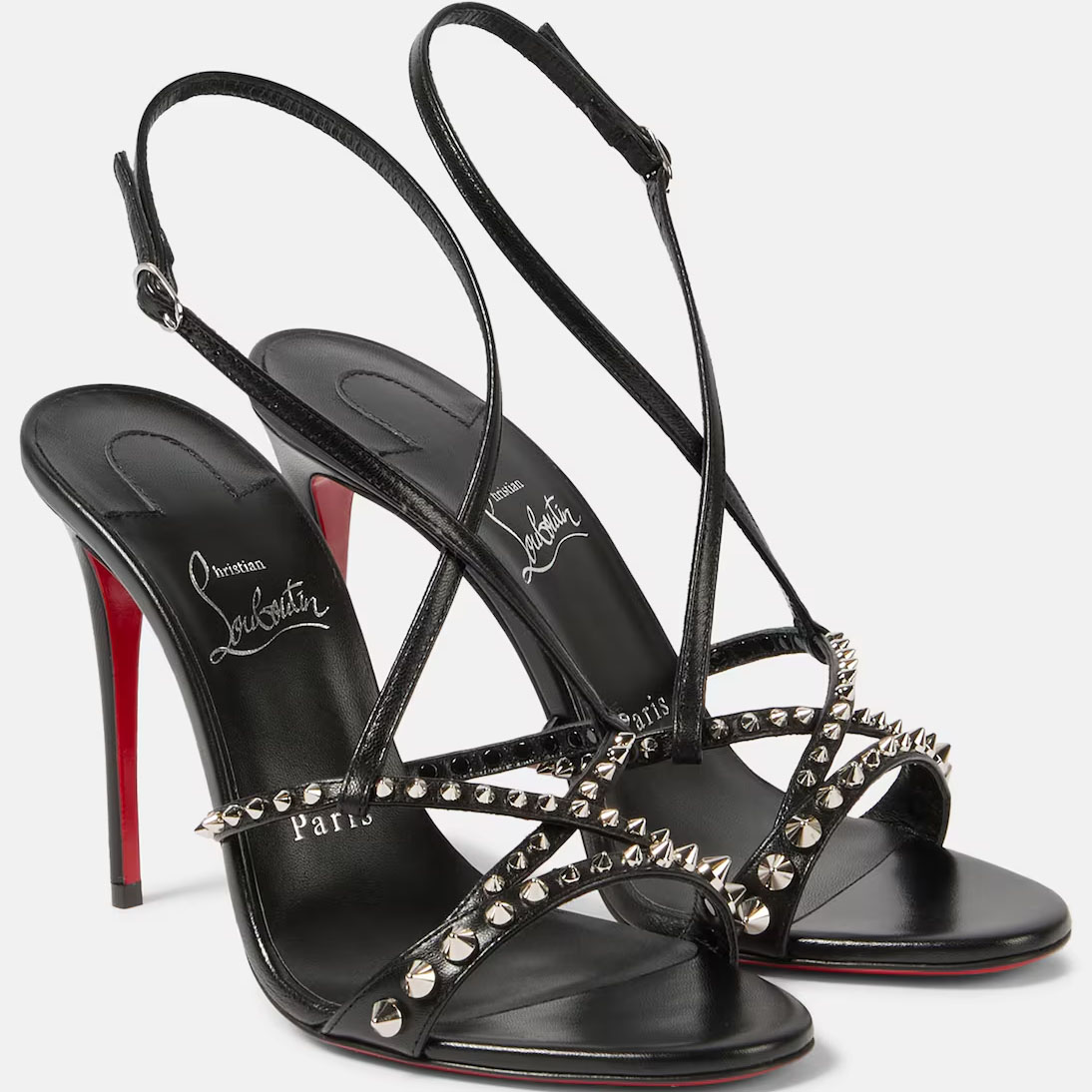 Christian Louboutin Sandálias de salto alto pretas com tachas.