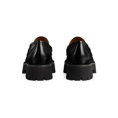 Gucci black thick soled loafers