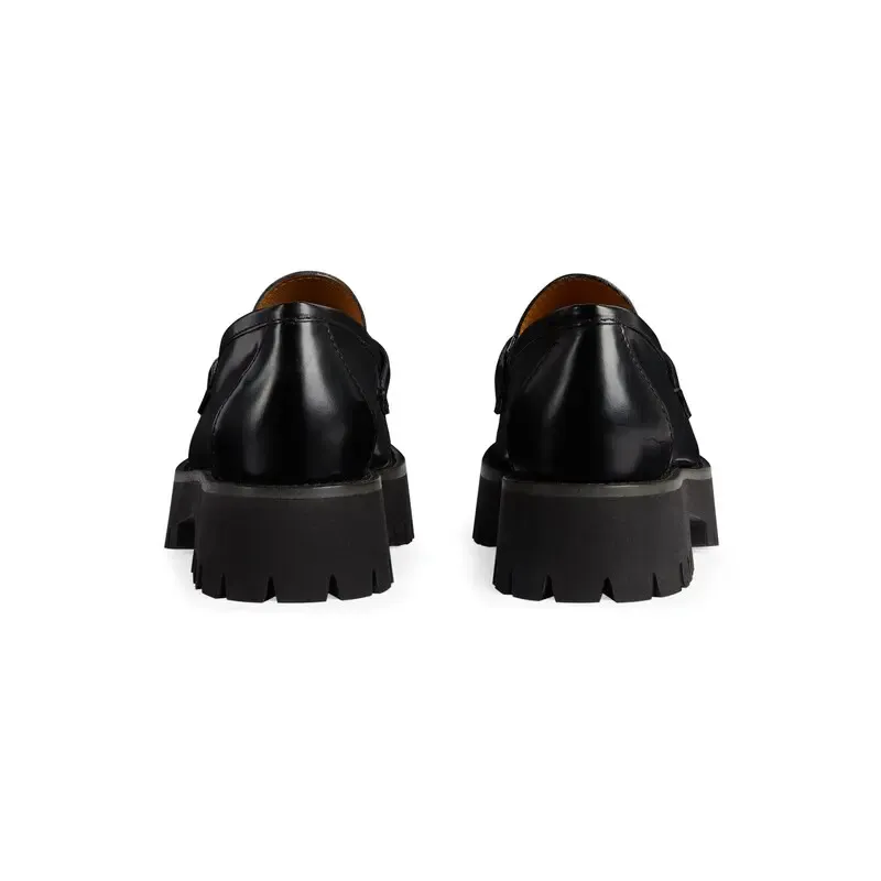 Gucci black thick soled loafers