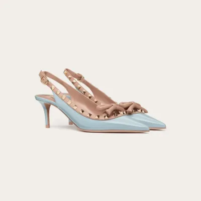 VALENTINO Lace-up heels in patent leather with rivet bow in the same color (heel height: 6cm)