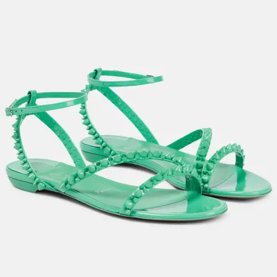 Christian Louboutin Green flat sandals with diagonal rivets