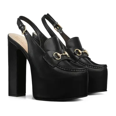 Gucci black thick soled rear lace up high heels