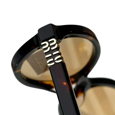 Miu Miu Oval glasses leopard tawny/transparent/ivory/black silver/black/leopard grey/transparent leopard color Size 50-18-140