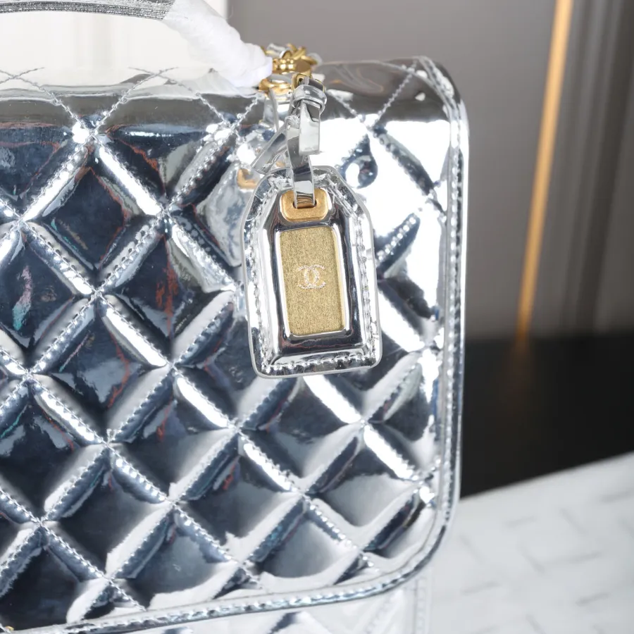 Chanel Silver / Gold / Black  patent leather Backpacks