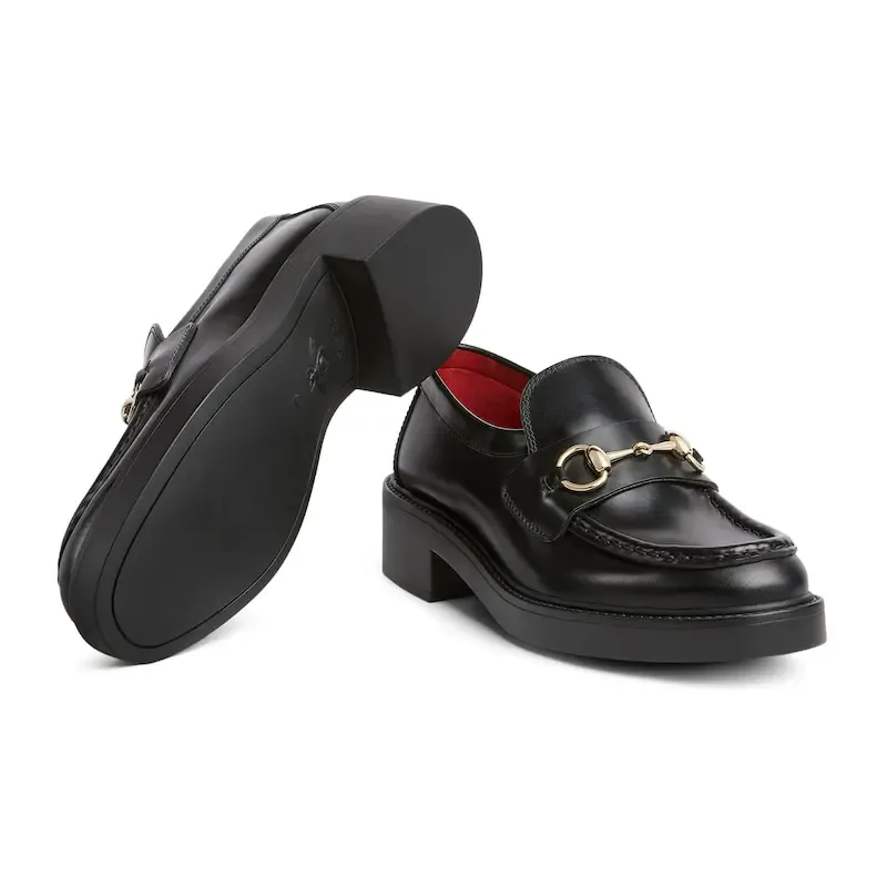 Gucci black thick soled loafers