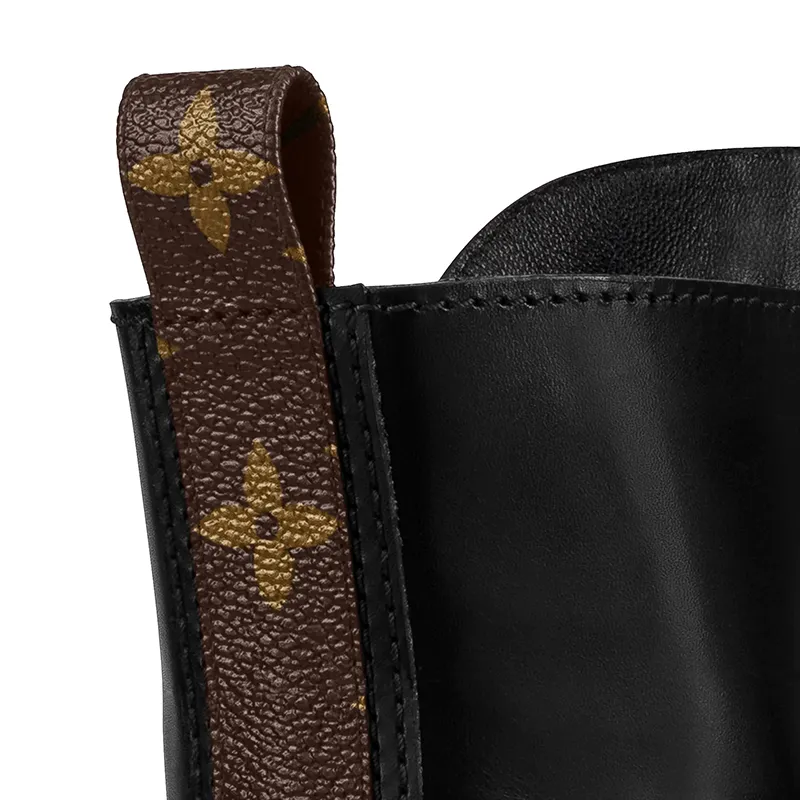 Louis Vuitton Runway Martens and nude boots