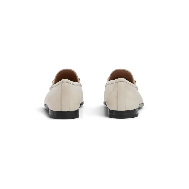 Gucci white patent leather loafers