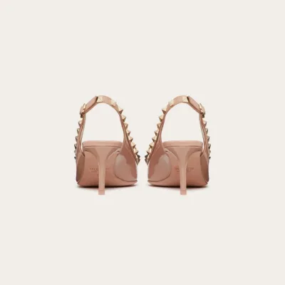 VALENTINO Lace-up heels in patent leather with rivet bow in the same color (heel height: 6cm)