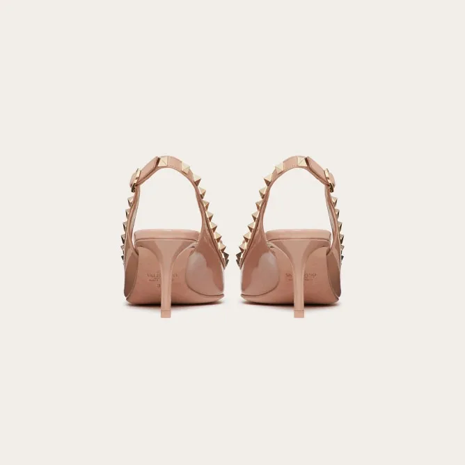 VALENTINO Lace-up heels in patent leather with rivet bow in the same color (heel height: 6cm)