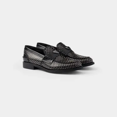 PRADA Studded shiny leather loafers