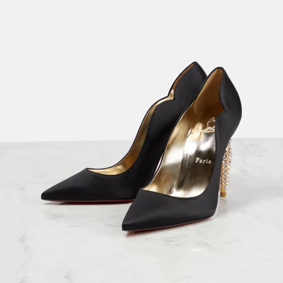Christian Louboutin Black heels with crystal embellished heel of shoe
