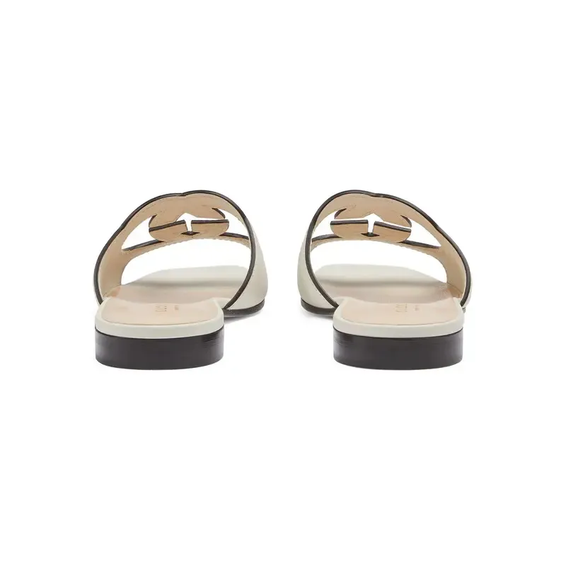 Gucci white flat bottom slippers