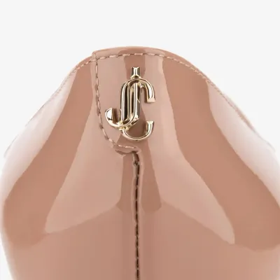 JIMMY CHOO JC badge embellishes pink high heels