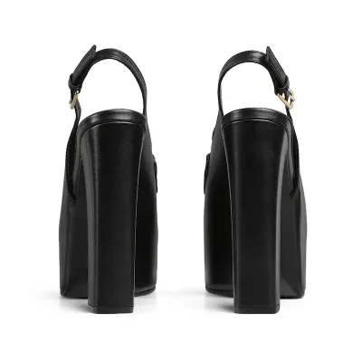 Gucci black thick soled rear lace up high heels