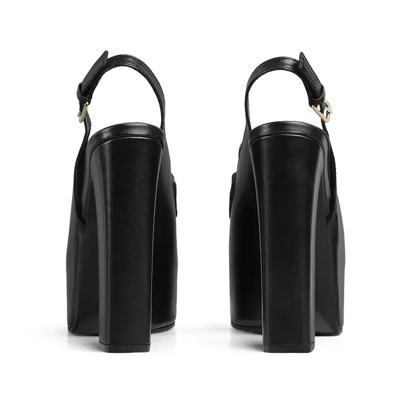 Gucci black thick soled rear lace up high heels