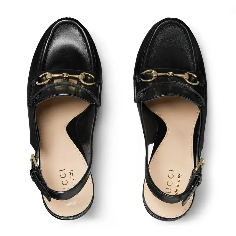 Gucci black thick soled rear lace up high heels