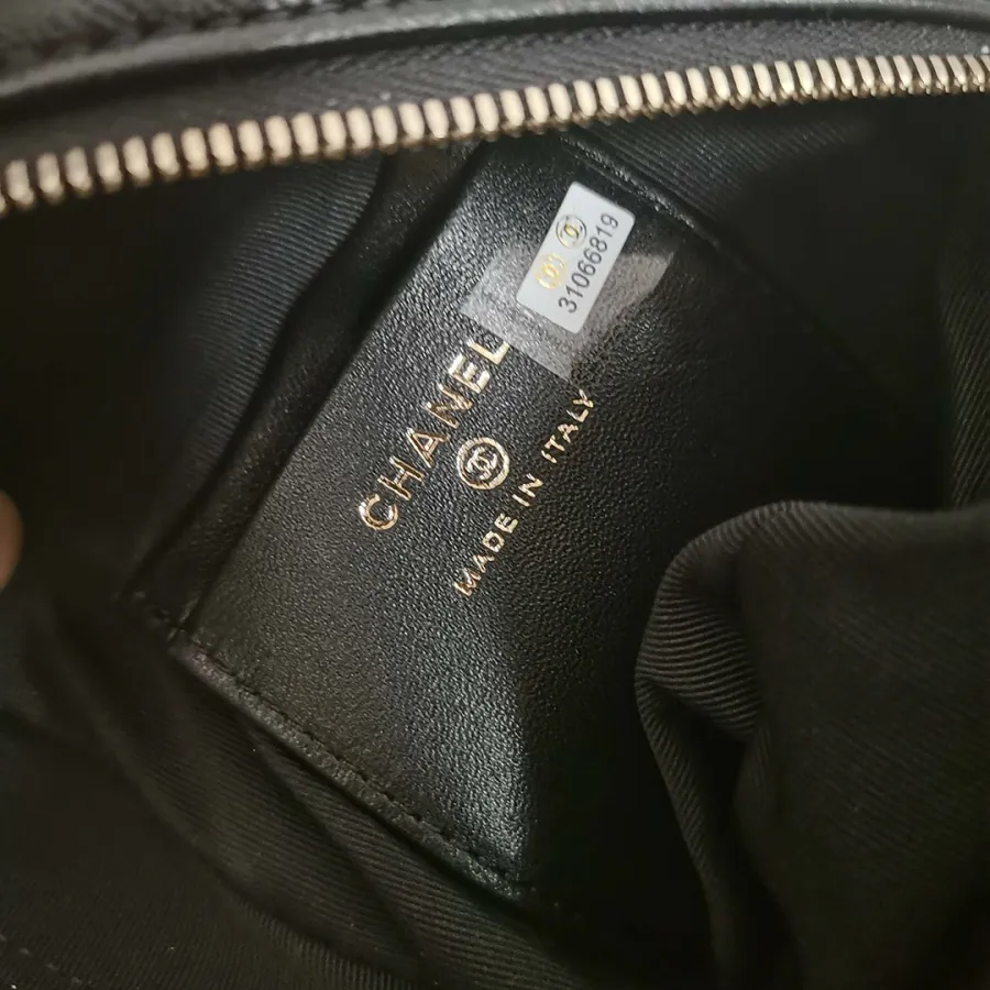 Chanel Black / White Quilted  Lambskin Leather