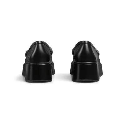 Gucci black slope heel loafers