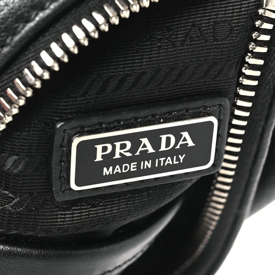 Prada Medium Logo Embossed Cross Sling Backpack Black Vitello Daino Leather Silver Hardware